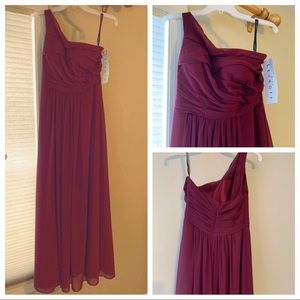 Deep red one shoulder floor length formal dress.